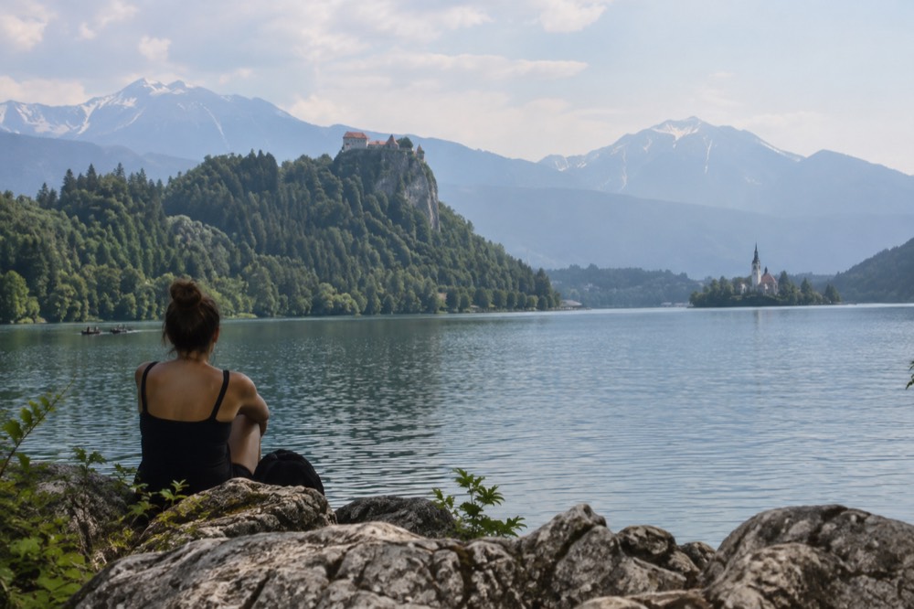 Bled Castle walls above the lake with the island visible in the distance