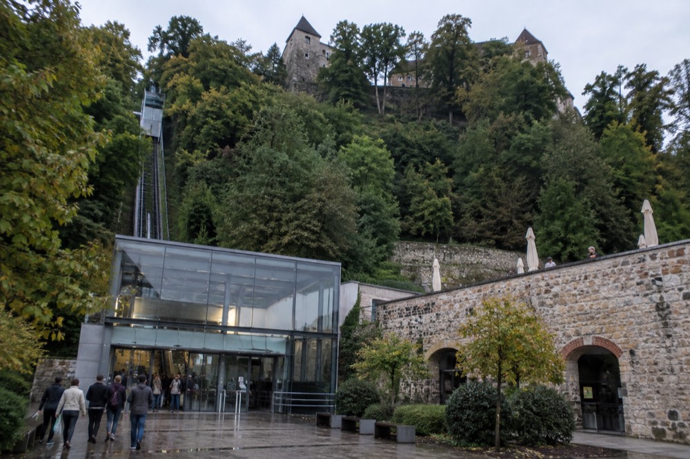 The Ljubljana castle funicular station below the tree covered hill above the old town