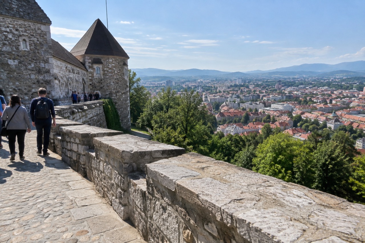 Ljubljana Castle on its wooded hill above the red rooftops of the old city centre