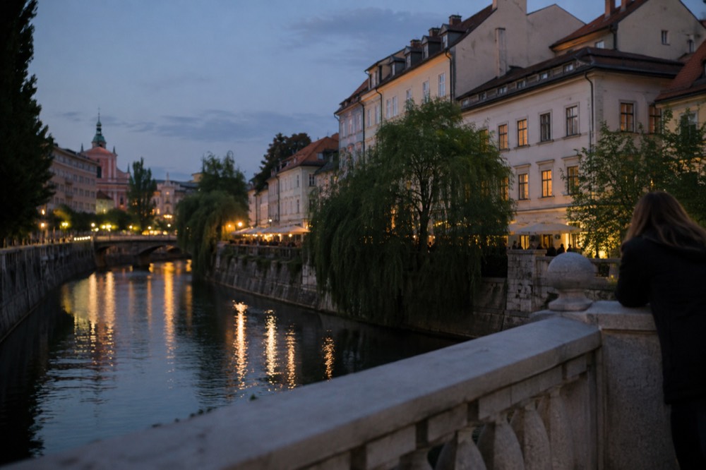 Evening light over the Ljubljanica river and the old city centre of Ljubljana