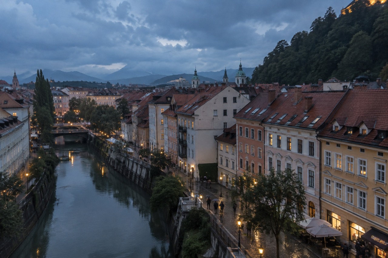 Rain clouds over the Ljubljana old town rooftops and the Ljubljanica river