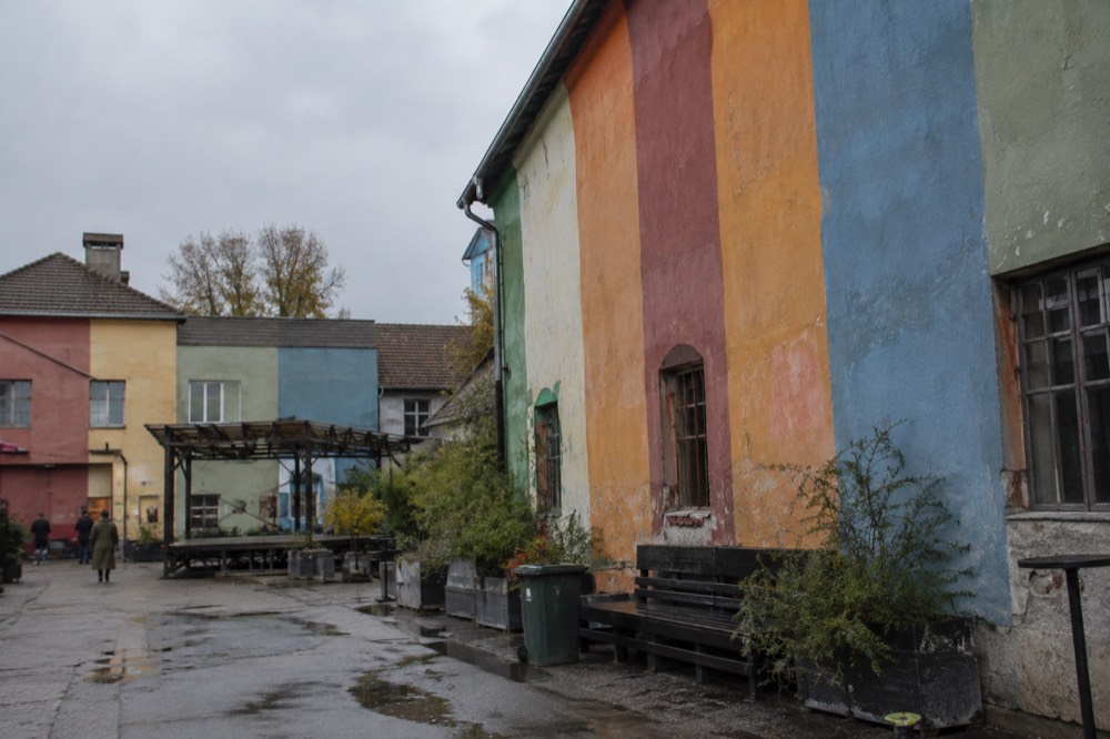 tall bands of colour covering the side wall of a barracks building