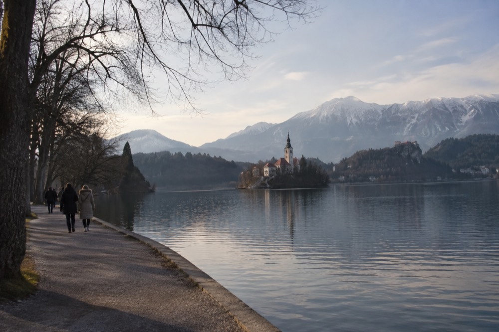 The flat lakeside path at Lake Bled with the island church on the water