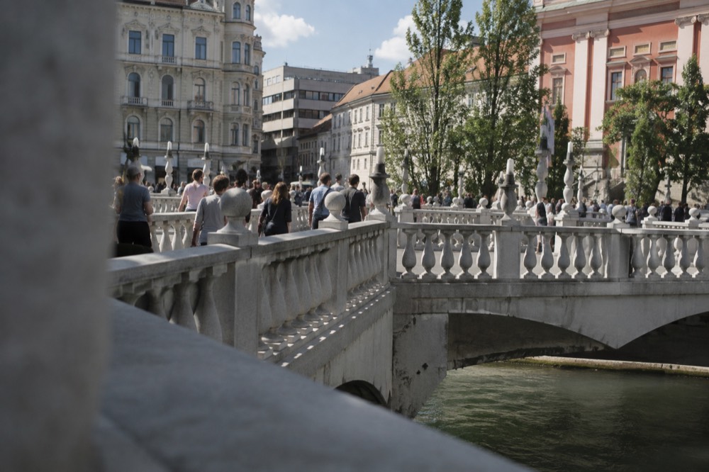Prešeren Square and the Triple Bridge on a busy afternoon