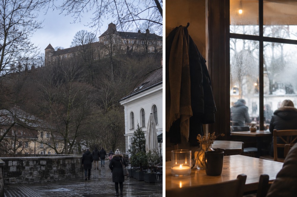 A warm café interior on a Ljubljana street with steamed windows and winter coats on hooks
