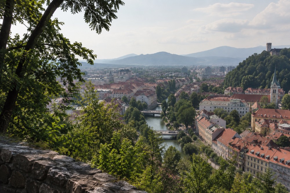 A view over Ljubljana from a wooded hill above the city