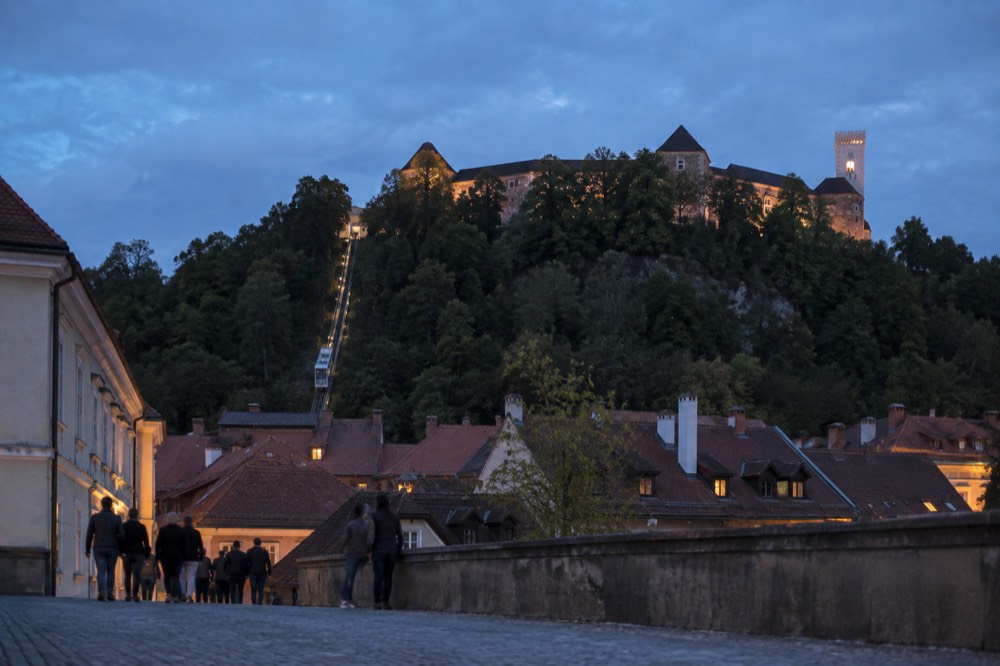 The funicular railway climbing the hill to Ljubljana Castle above the old town rooftops