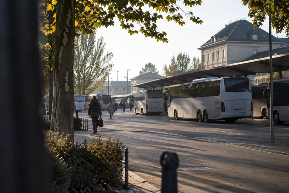 Coaches parked at the Ljubljana bus station beside the railway station in the morning