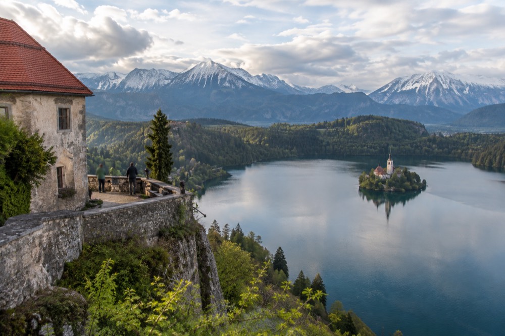 Bled Castle terrace overlooking the lake and island in morning light
