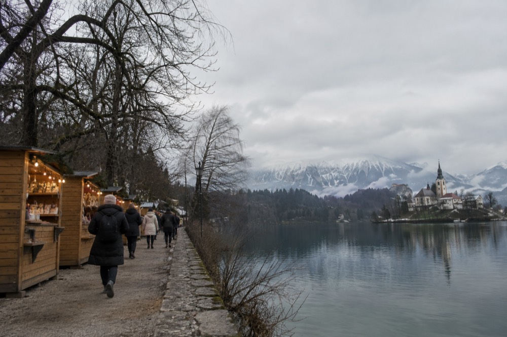 Small Christmas market stalls along the lakeside promenade in Bled in December